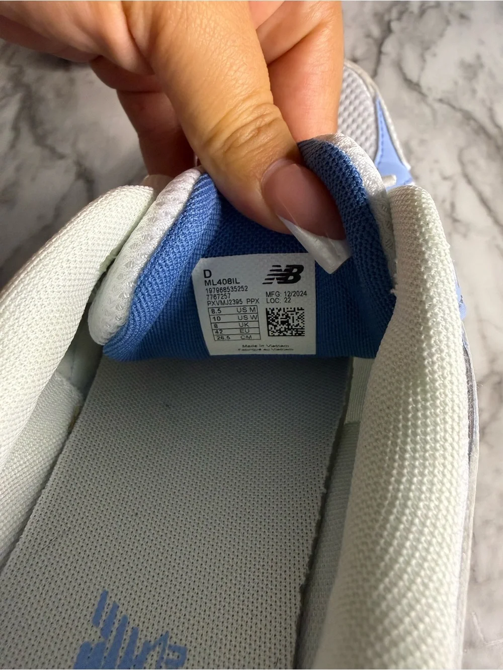 New Balance men’s White & Light Blue Athletic Sneakers